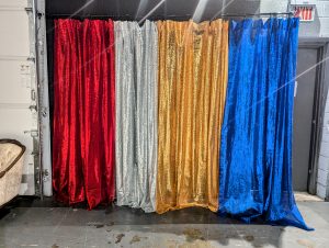 sequin curtains in red, silver, gold, and blue